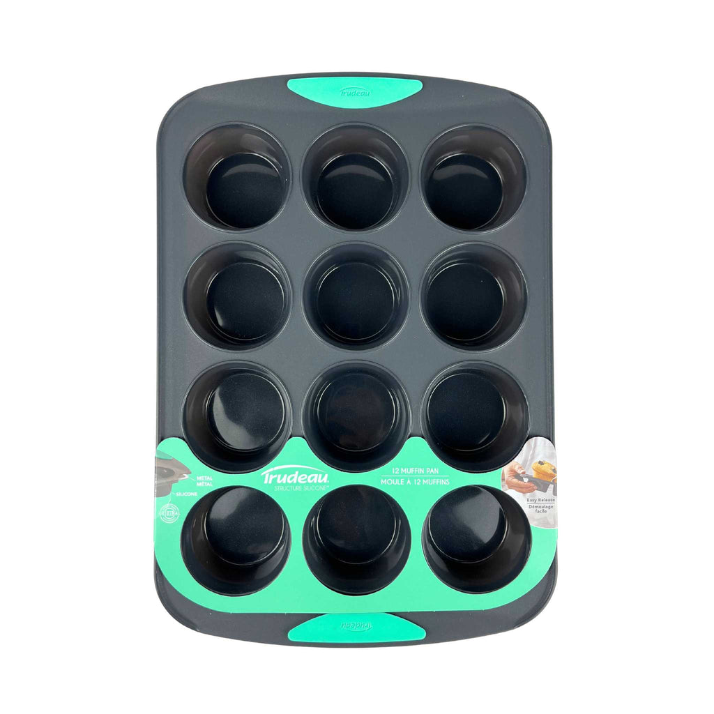 Silicone muffin pan with mint color accents.