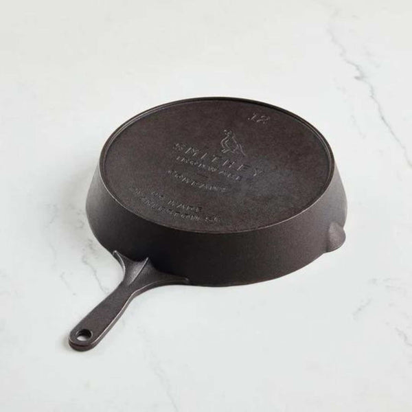 http://www.honeycombkitchenshop.com/cdn/shop/files/Smithey-No-12-Cast-Iron-Skillet-Bottom_600x600.jpg?v=1690903573