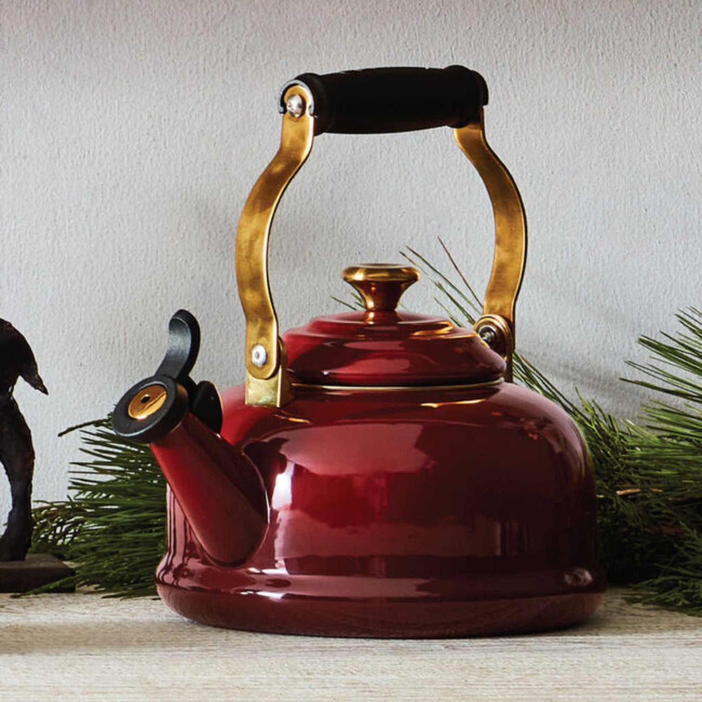Le Creuset 1.7 quart whistling kettle in rhone with gold knob