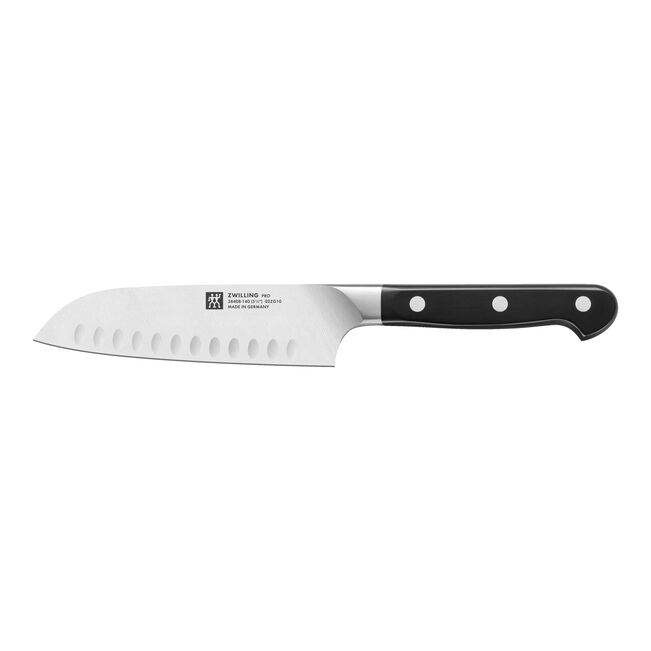 Knife with black handle on a white background