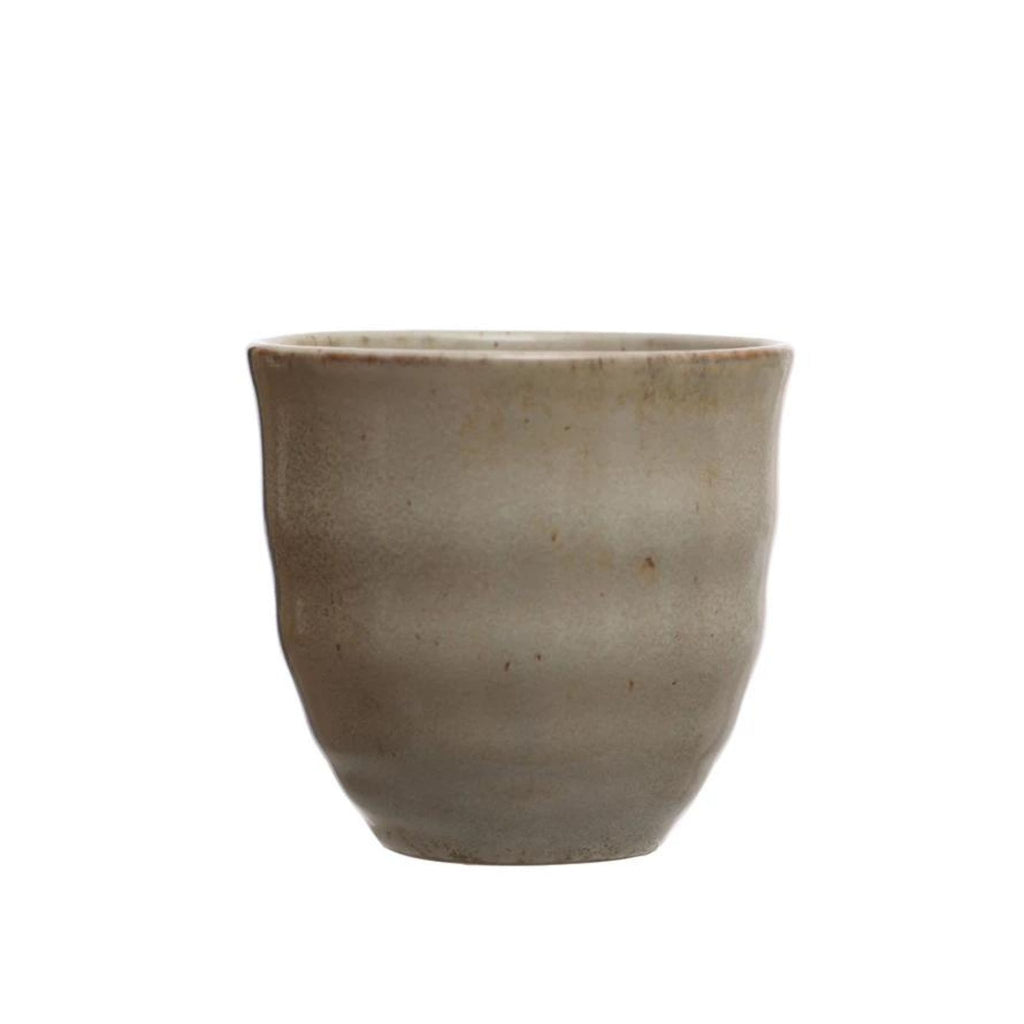gray stoneware cup without handle