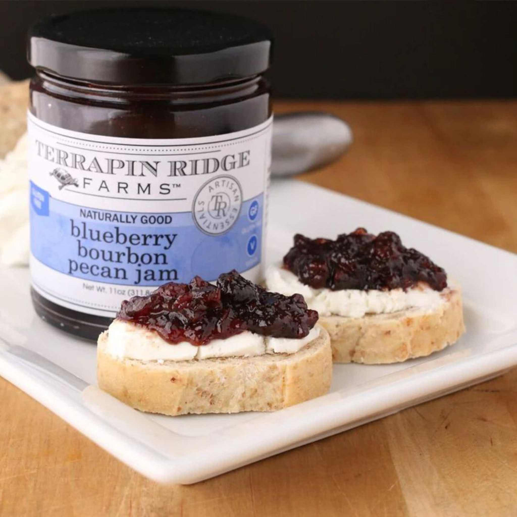 Blueberry bourbon pecan jam Terrapin Ridge Farms 5 oz. jar pictured with cheese and bread
