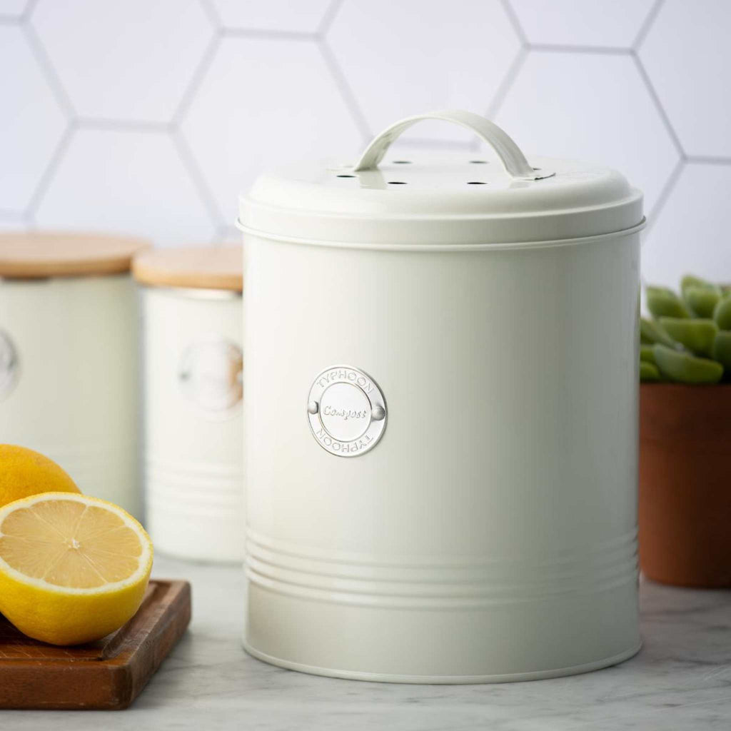 Compost caddy in cream color. Lifestyle image