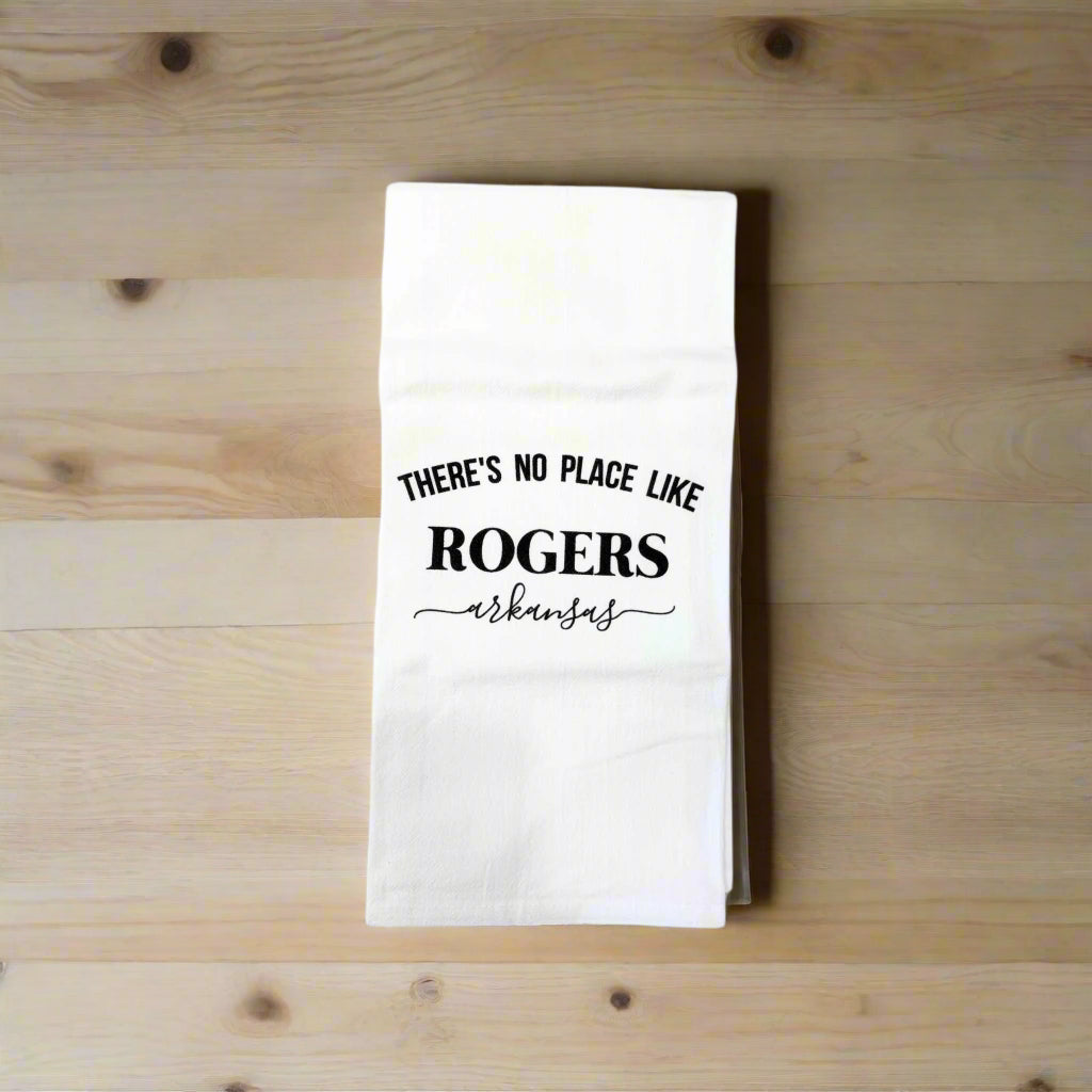 White dishtowel that says There's no place like Rogers Arkansas