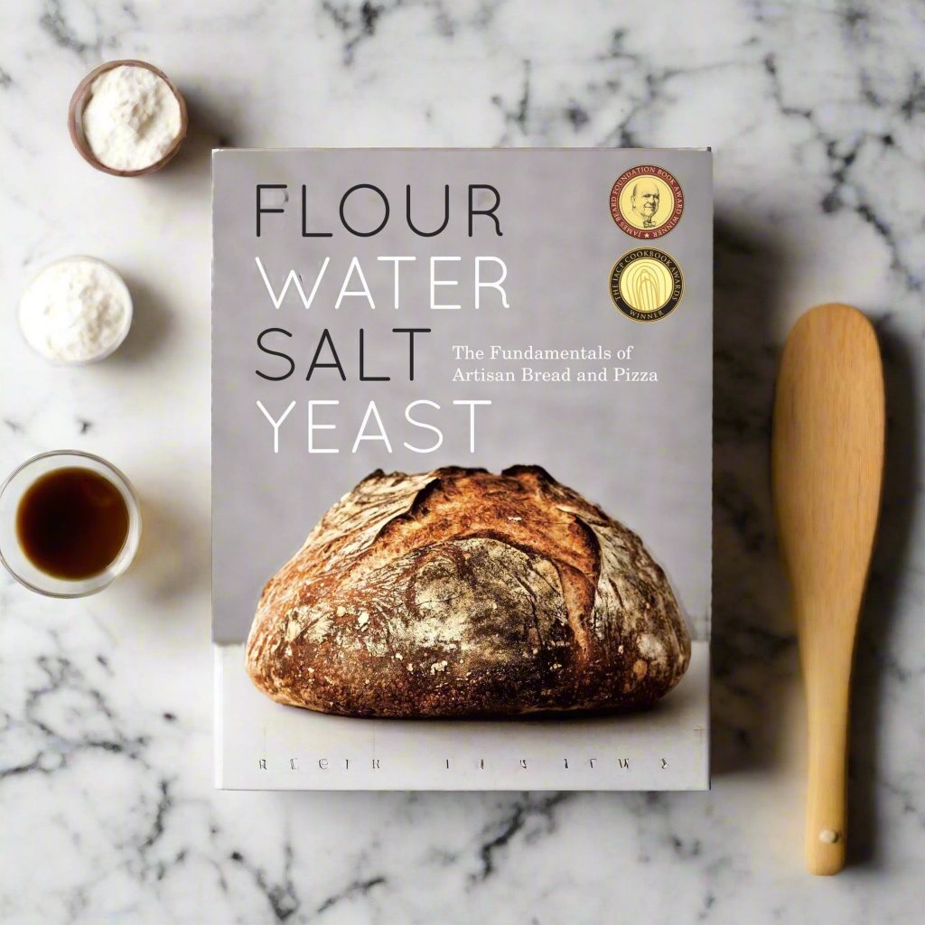 cookbook with baked boule on cover