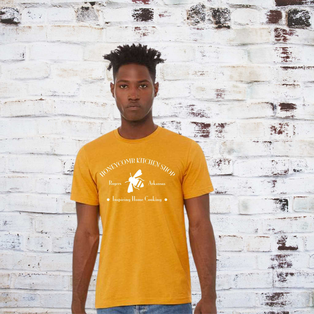 HKS bee t-shirt in mustard color. Lifestyle image.