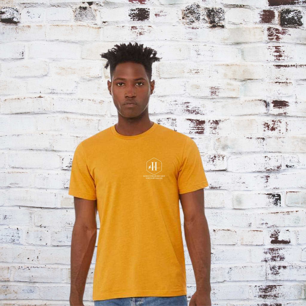 HKS cooks tools shirt in mustard. lifestyle image.