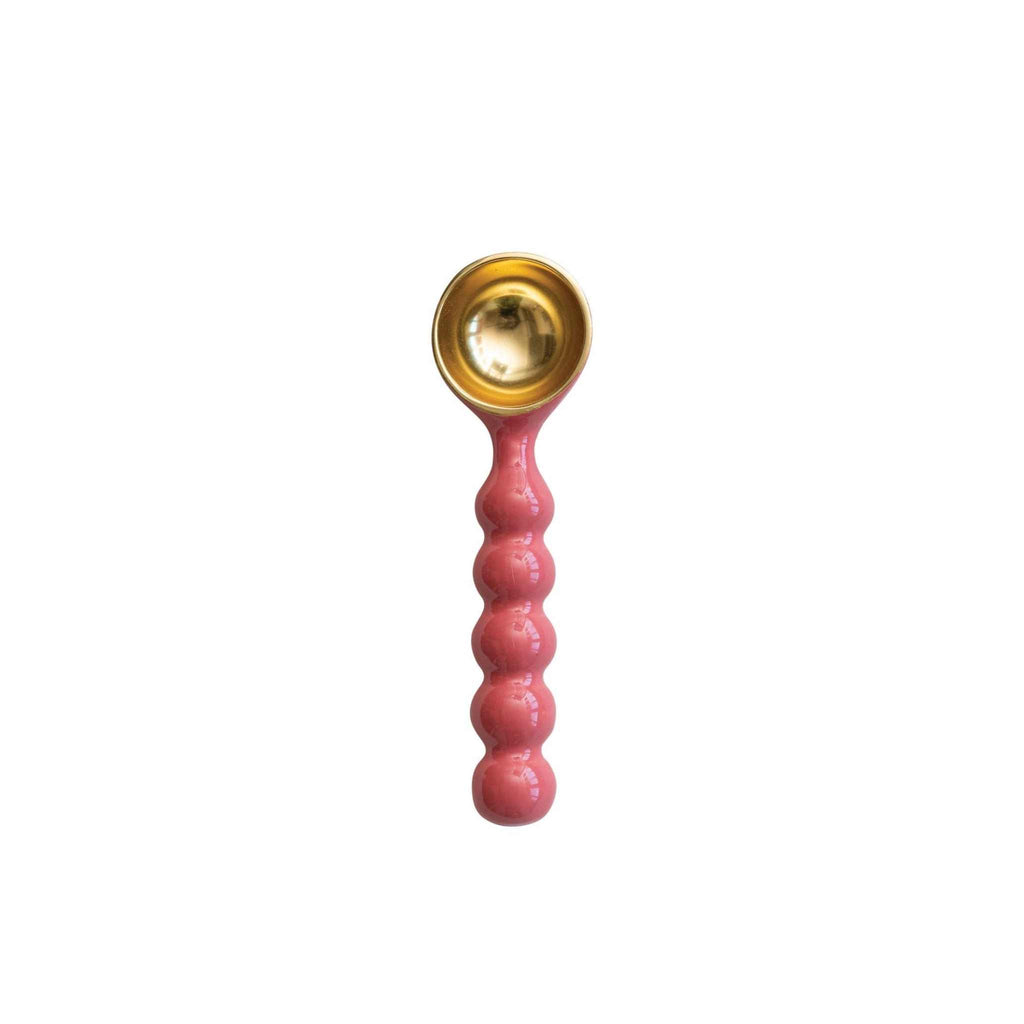 Ice cream scoop pink and gold top view