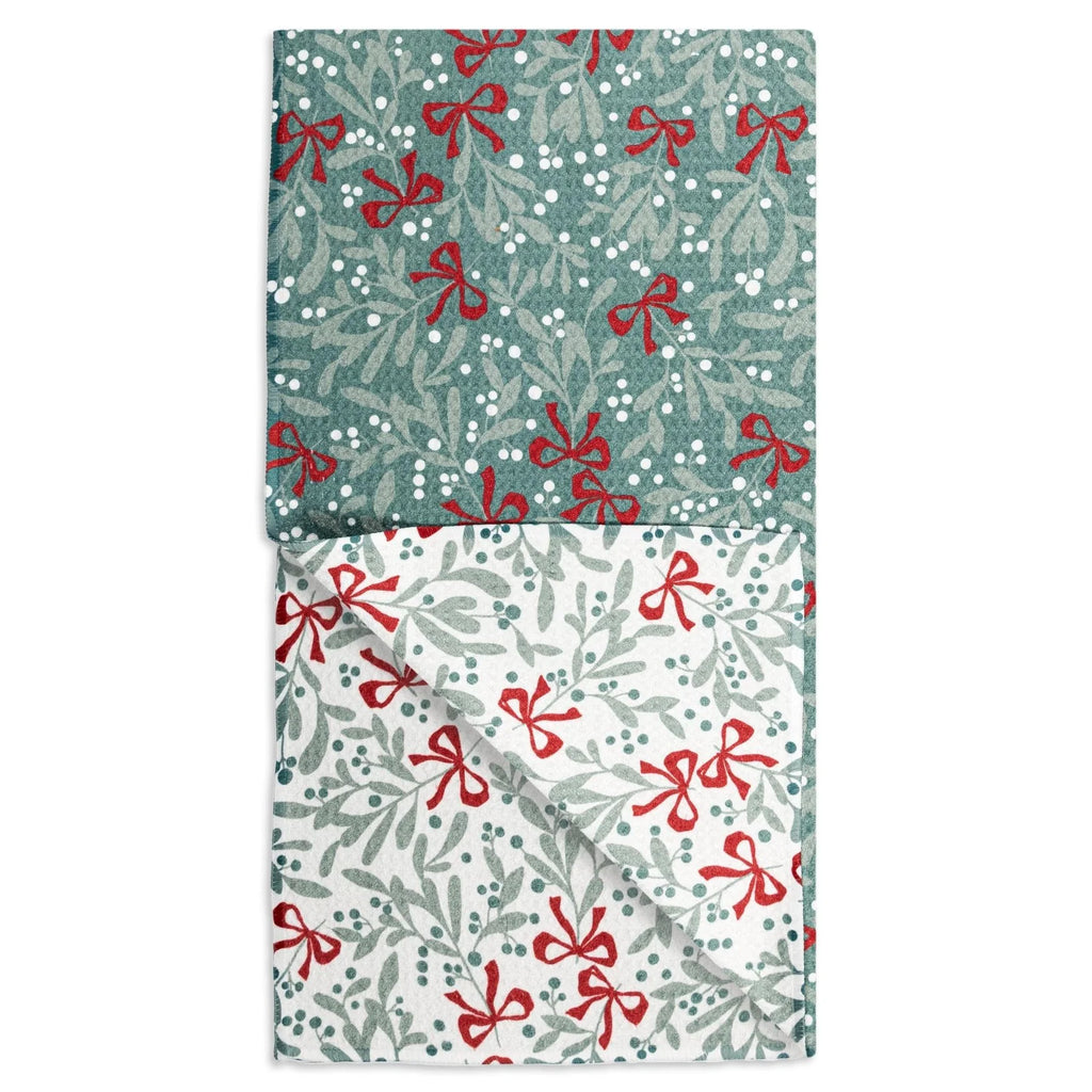 double sided dish towel with mistletoe greens, white berries, and red bows 