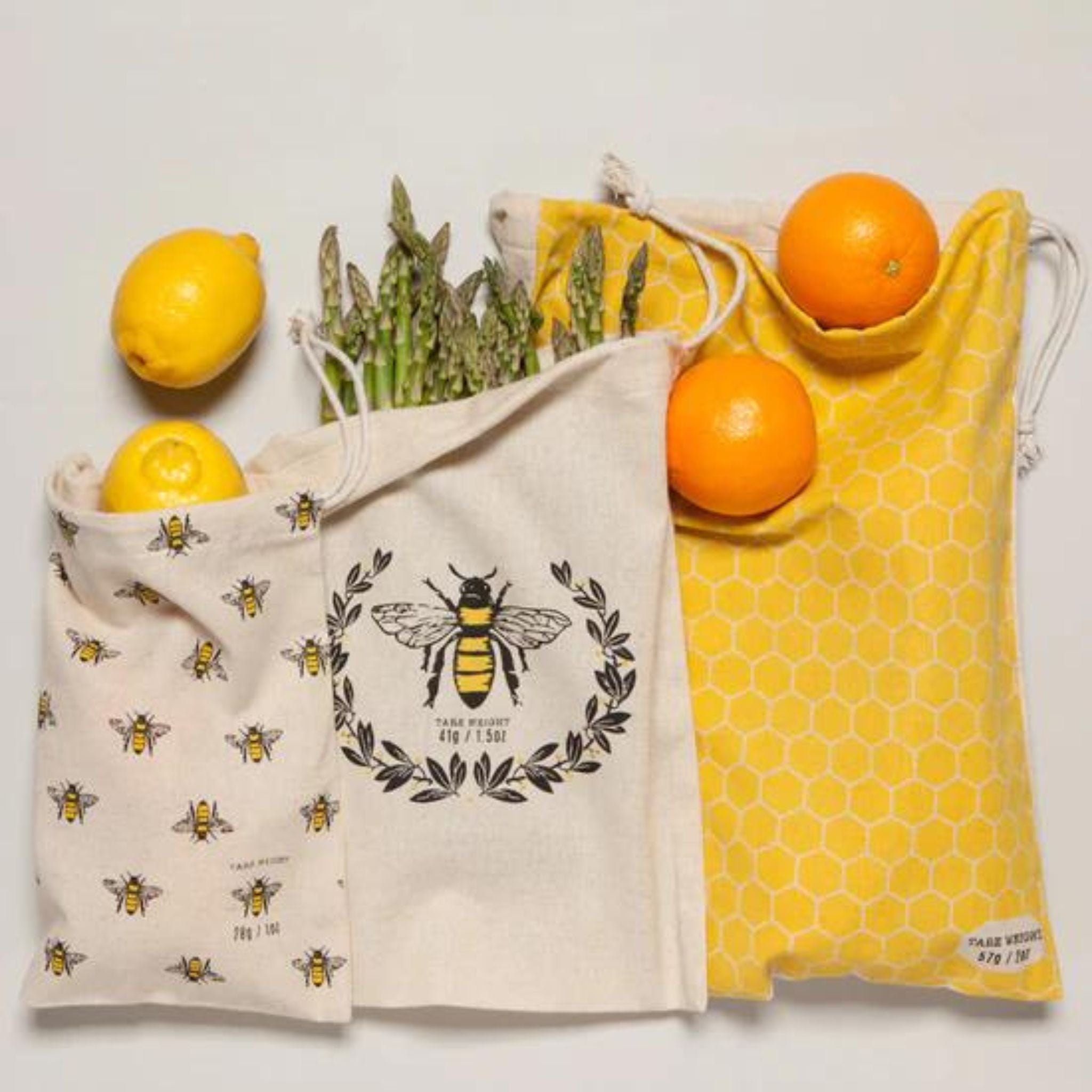 3 cotton draw string bags with different bee designs