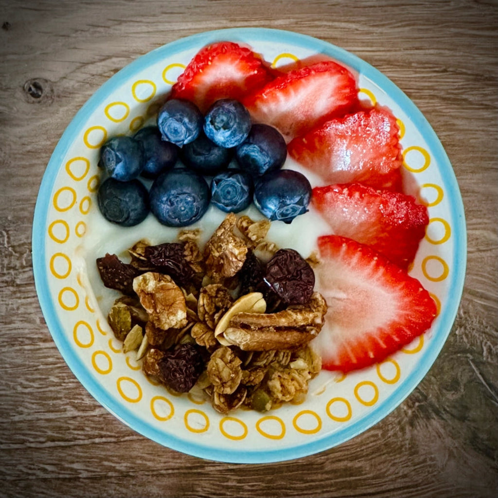 Cherry Crunch Trail Granola with yogurt & berries