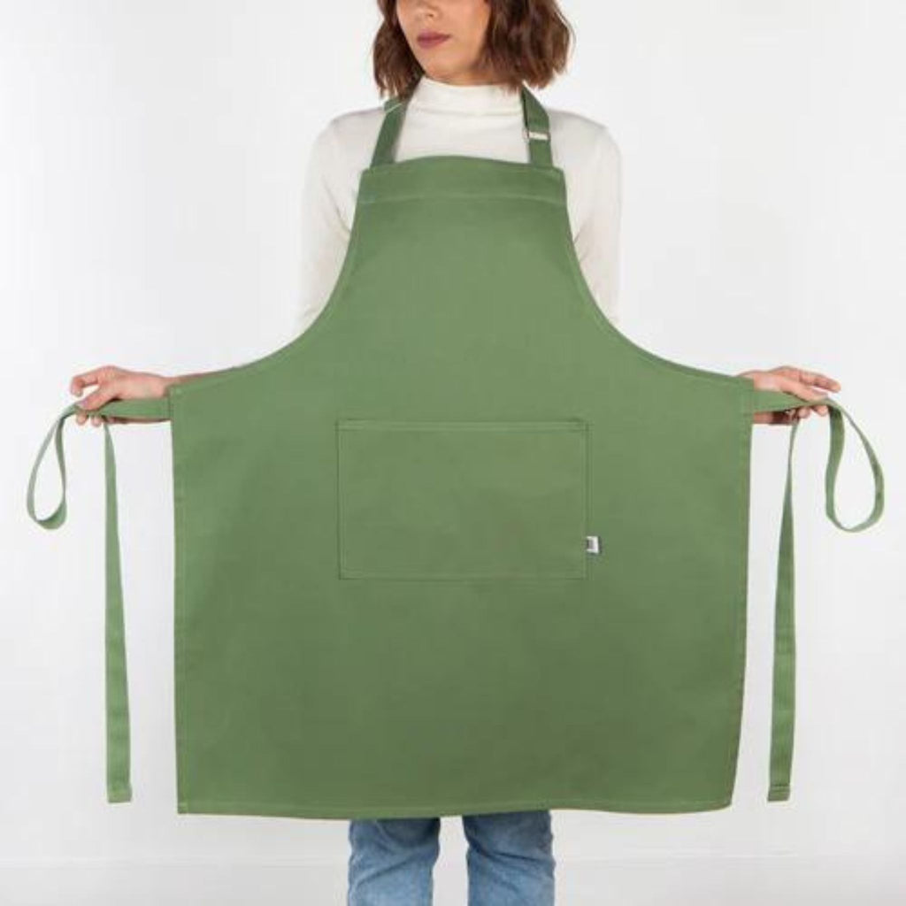 green apron on model