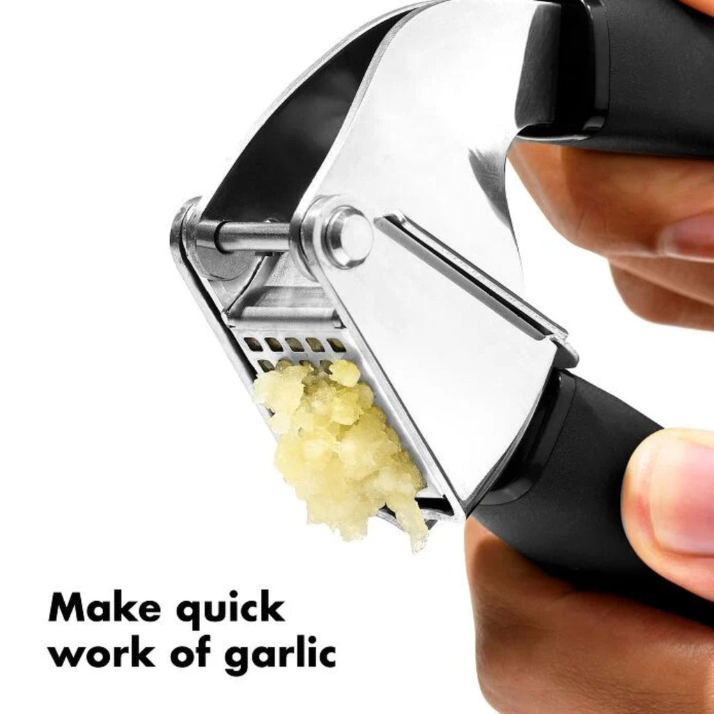 oxo garlic press in use