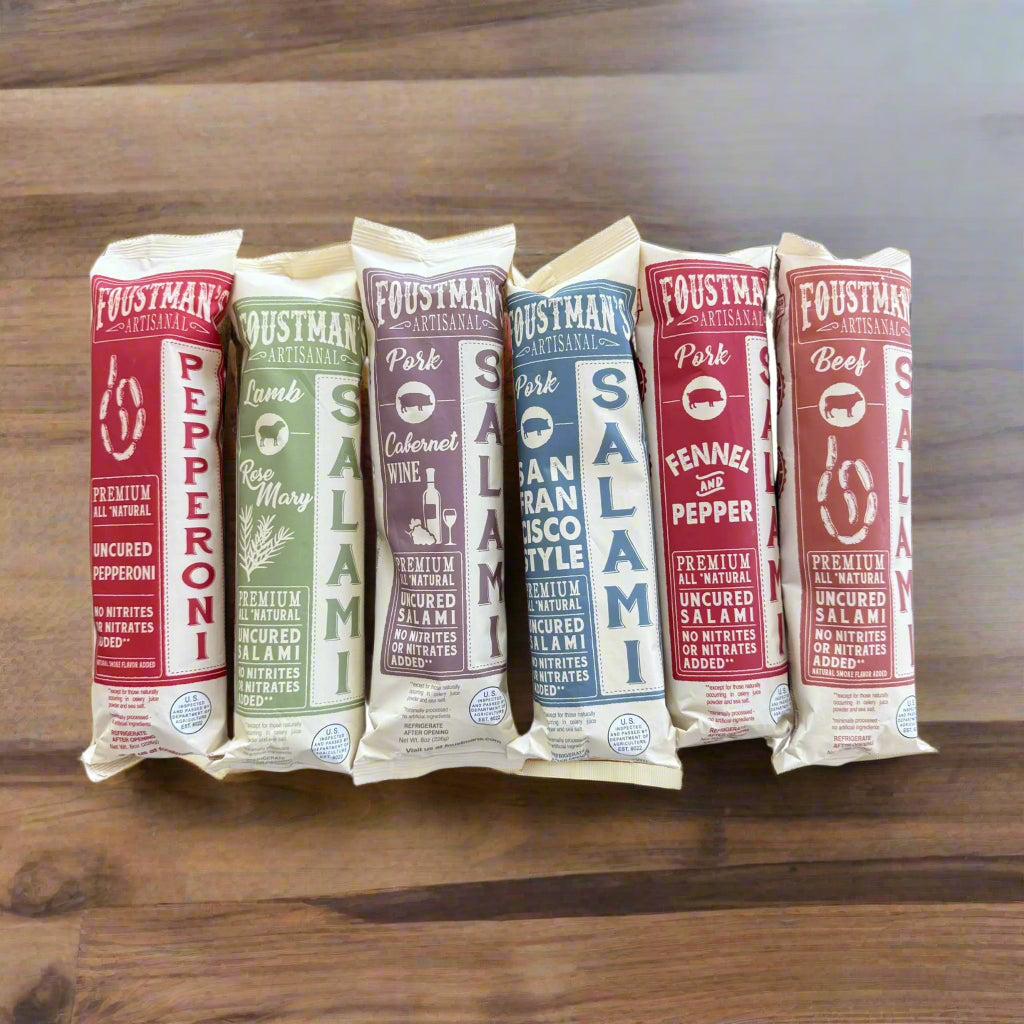Corporate gift charcuterie package against a wooden table background